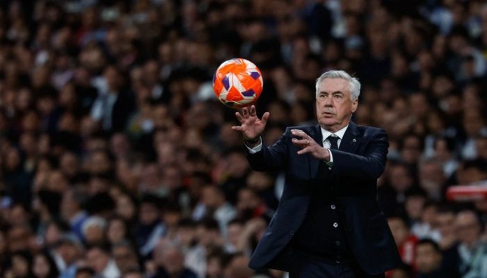 111046047-real-madrids-italian-coach-carlo-ancelotti-catches-the-ball-during-the-spanish-league.jpg