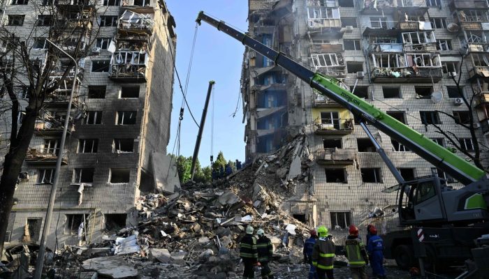 111442834-ukrainian-rescuers-conduct-a-search-and-rescue-work-in-a-heavily-damaged-residential-build.jpeg